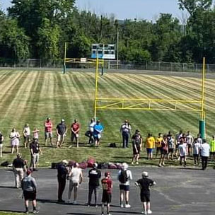 Touchdowns and Teamwork: Masons and Sheriffs Score Big with Youth&nbsp;Camp