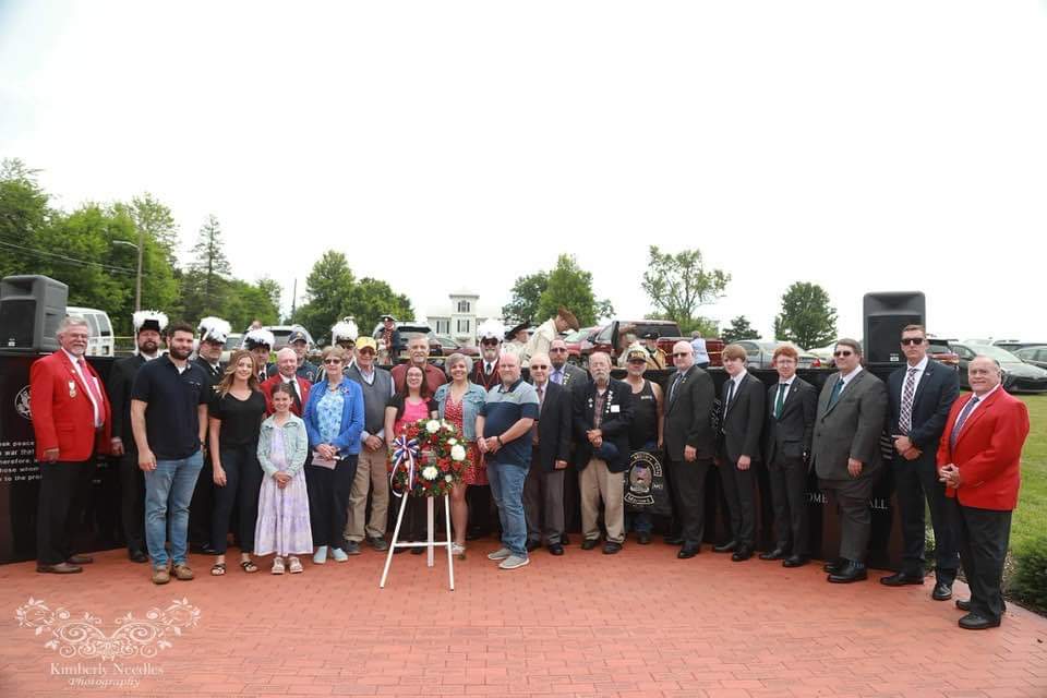 Masons from many lodges line up behind Bill Woods family at the Veterans Memorial in Middletown, Virginia.