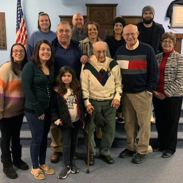 Bill Wood poses with his family for a group photo after receiving the William N. Wood Award on December 15, 2021