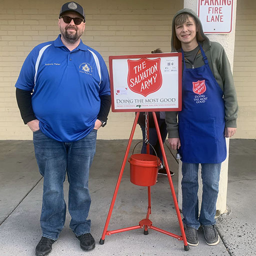 Brother Anthony and his son ringing the bell for the Front Royal Salvation Army's Red Kettle campaign on December 16, 2023 at Big Lots