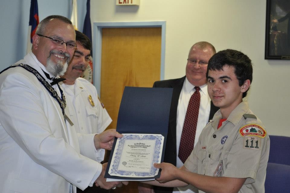 Worshipful Dennis Haas presents the recognition