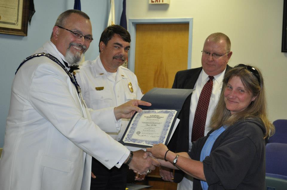 Worshipful Dennis Haas presents the recognition