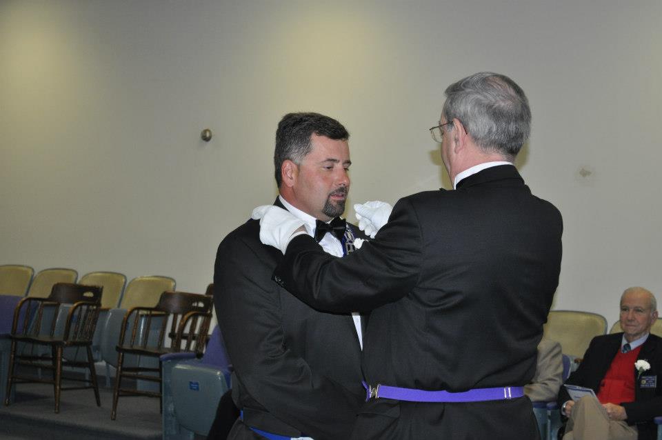 Brother Davidson presents the Marshal jewels to Neil Powell, Jr.