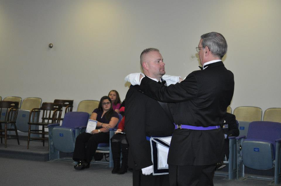 Brother Rowland is presented the jewels of the Senior Warden.