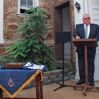 Front Royal officials open cornerstone set by local masons at Town Hall in&nbsp;1935