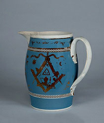 Masonic pitcher with freemasonry symbols such as the square and compass.