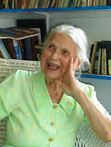 Photograph of Sister Margaret Yost O’Halloran smiling and wearing a light green blouse.