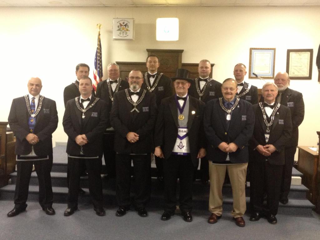 The officers of Unity Lodge 146 with DDGM Joel Ratliff.
